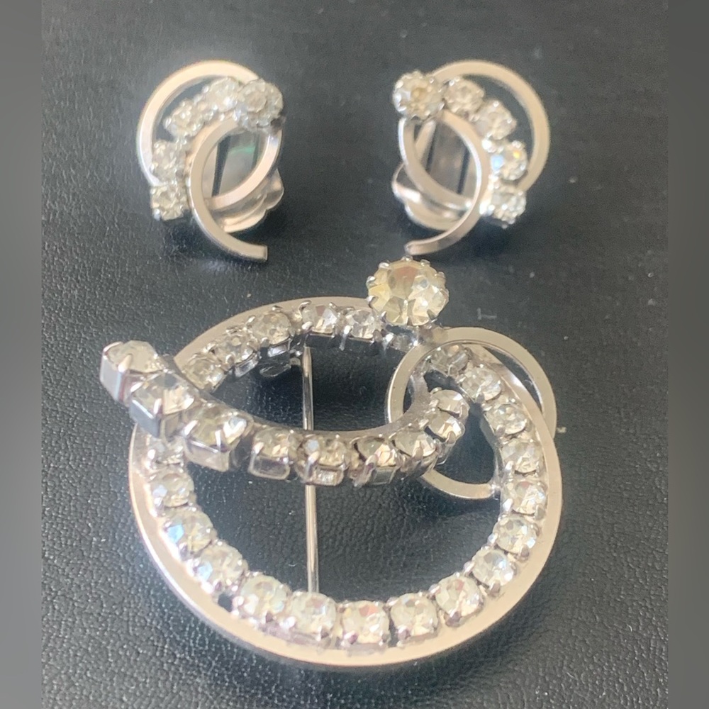Continental signed designer brand vintage brooch and clip earrings set
